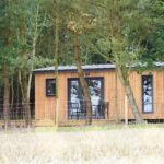 a cabin lodge showing the concept of a lodge retreat on a budget